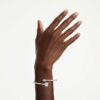 Idyllia Bangle Mixed Cuts, Arrow, White, Rhodium Plated Idyllia Bangle Mixed Cuts, Arrow, White, Rhodium Plated